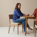 Chair lifestyle image with varied colorful clothing and candid interaction