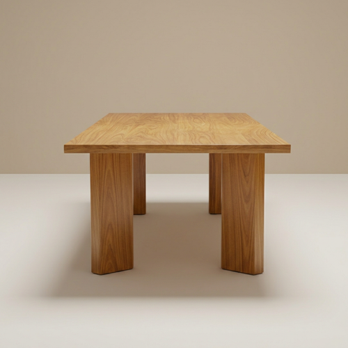 Teak dining table on a beige and off-white background