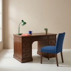 Teak writing desk styled with colorful office accessories
