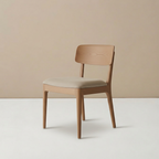 Teak dining chair with beige upholstered seat on a neutral background